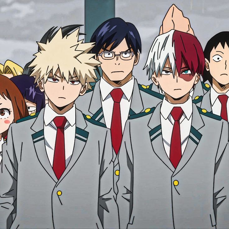 an anime group wearing suits and ties with their hands up in the air while standing next to each other