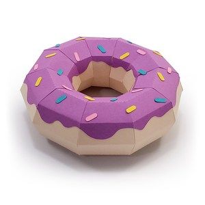 a purple doughnut with sprinkles on it