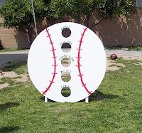 a large white frisbee sitting on top of a lush green field