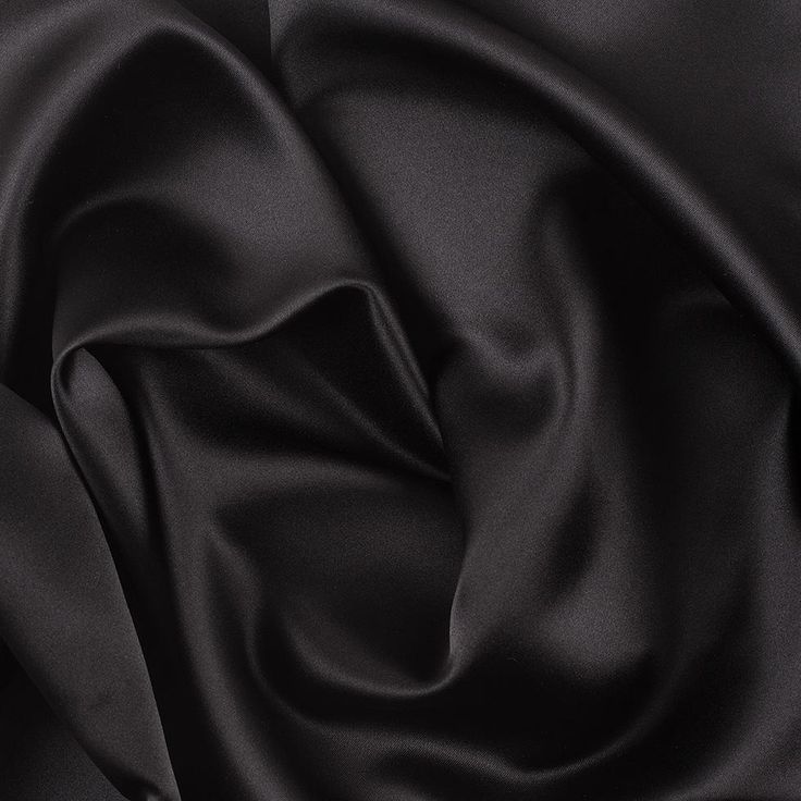 Trying to channel the look of a silk satin without the stress of care and cost? Here we have a collection of glossy polyester satins which are thin in structure and oh-so-smooth. Completely opaque and with no stretch, this material is very similar to a duller finished duchess satin. Easily create a classical and comfortable evening gown, blouse or lining with this chic satin fabric.

Note:This fabric is considered flame retardant under NFPA 701 standards and testing, so you can feel safe while y Duchess Material, Black Satin Fabric, Dress Gallery, Black Bridal, Duchess Satin, Mood Fabrics, Natural Silk, Polyester Satin, Black Solid