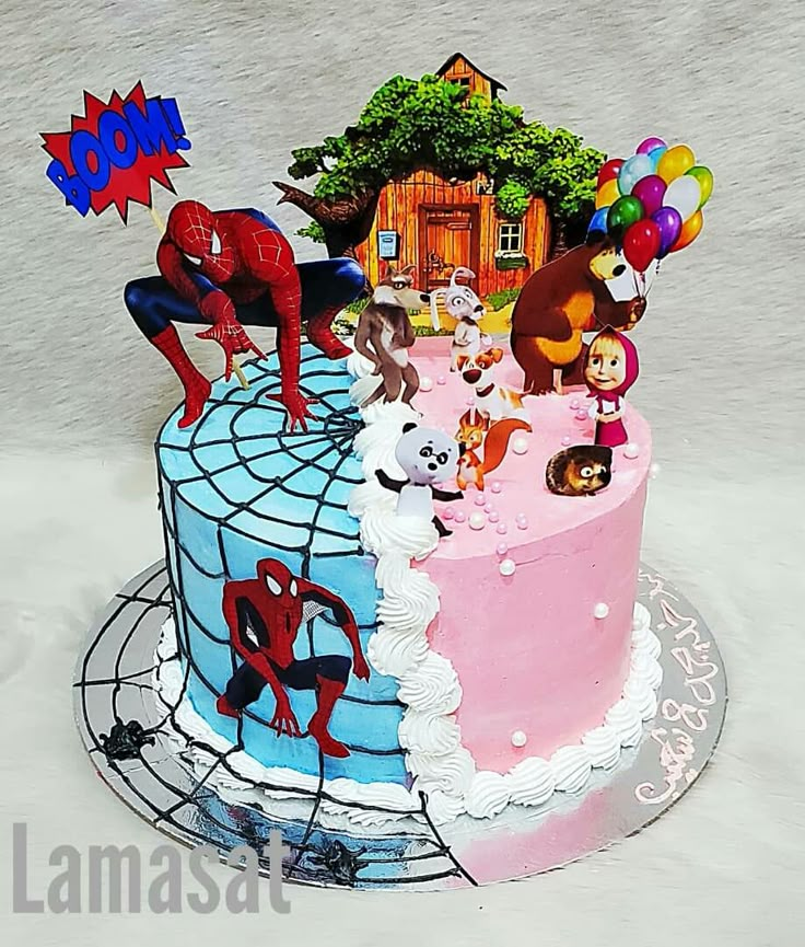 a birthday cake decorated with spiderman and other cartoon characters is shown in the snow