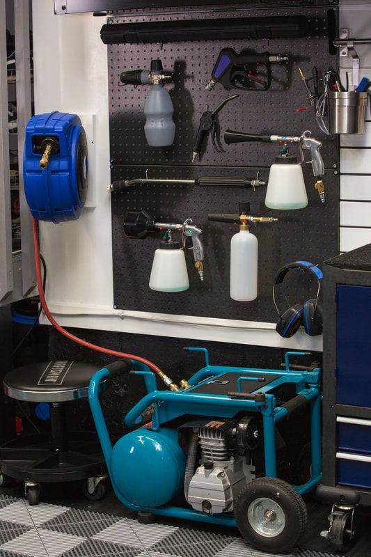 a room filled with lots of different types of tools and equipment on the wall next to each other