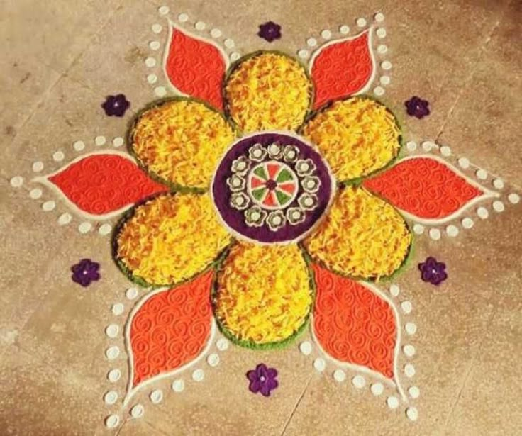 a colorful flower design on the ground