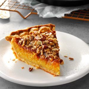 a slice of pecan pie on a white plate