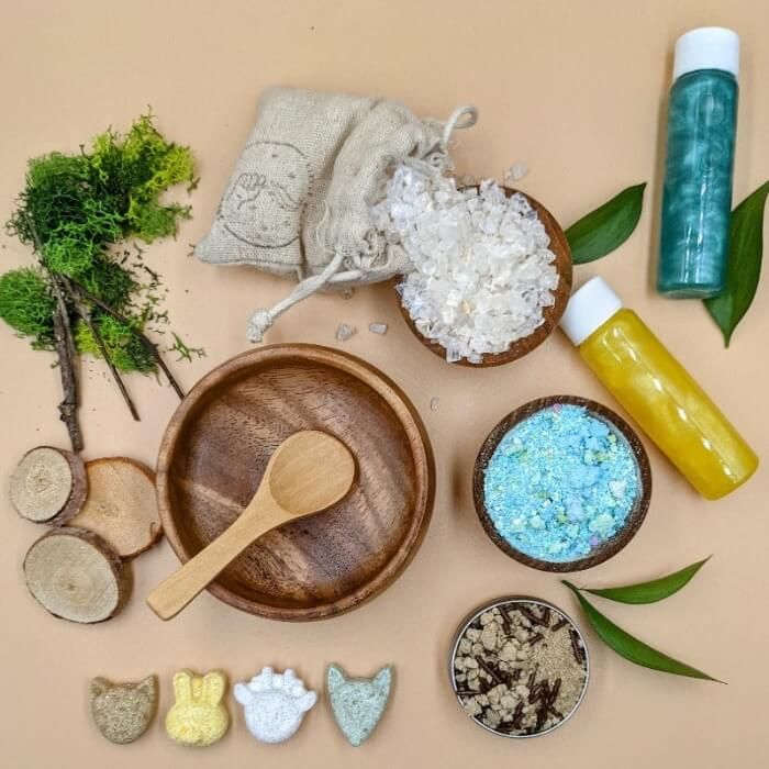 the ingredients are laid out on the table to be used for making soaps and body scrubs