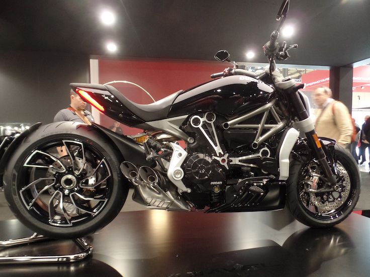 a motorcycle is on display in a showroom