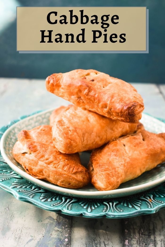 some food is stacked on top of each other in a blue and white plate with the words cabbage hand pies