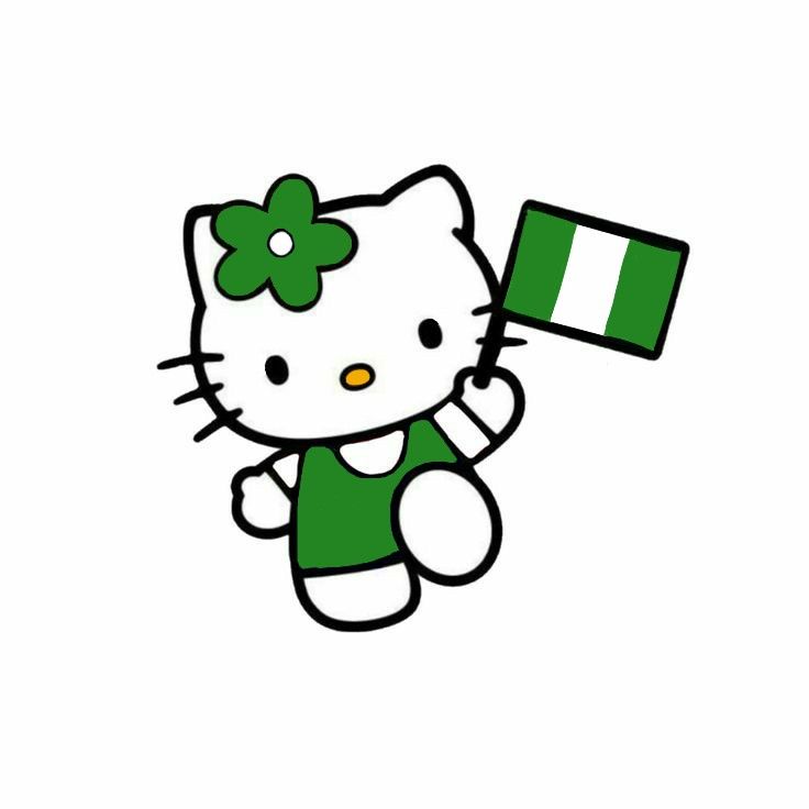 a hello kitty holding a flag and wearing a green shirt with a shamrock on it