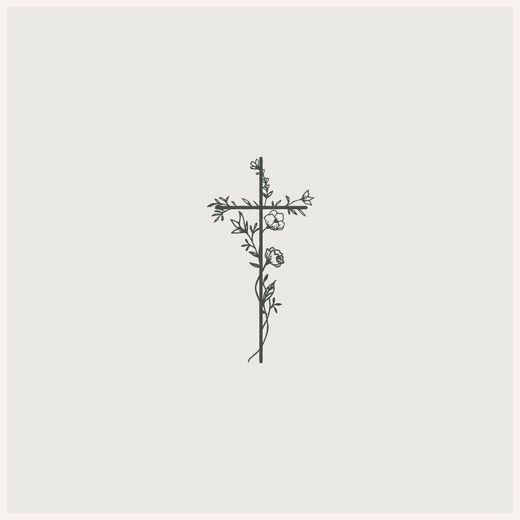 a cross with flowers drawn on it