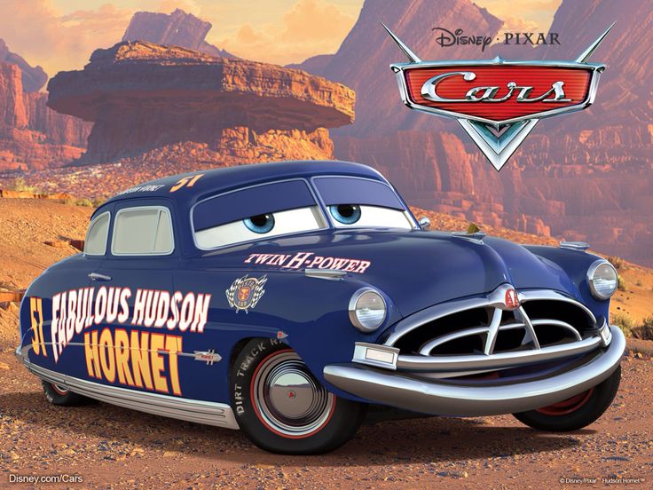 the character cars from disney pixar is shown in front of mountains and rocks