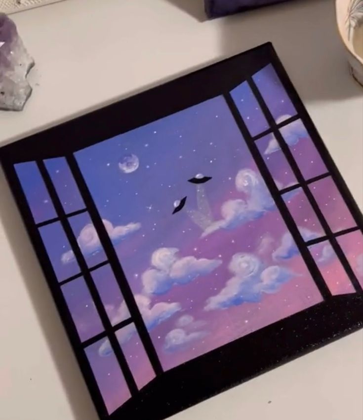 an image of a window with birds flying in the sky and clouds painted on it