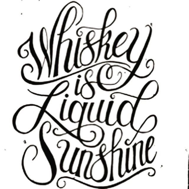 the words whiskey is liquid sunshine written in cursive type on white paper with black ink