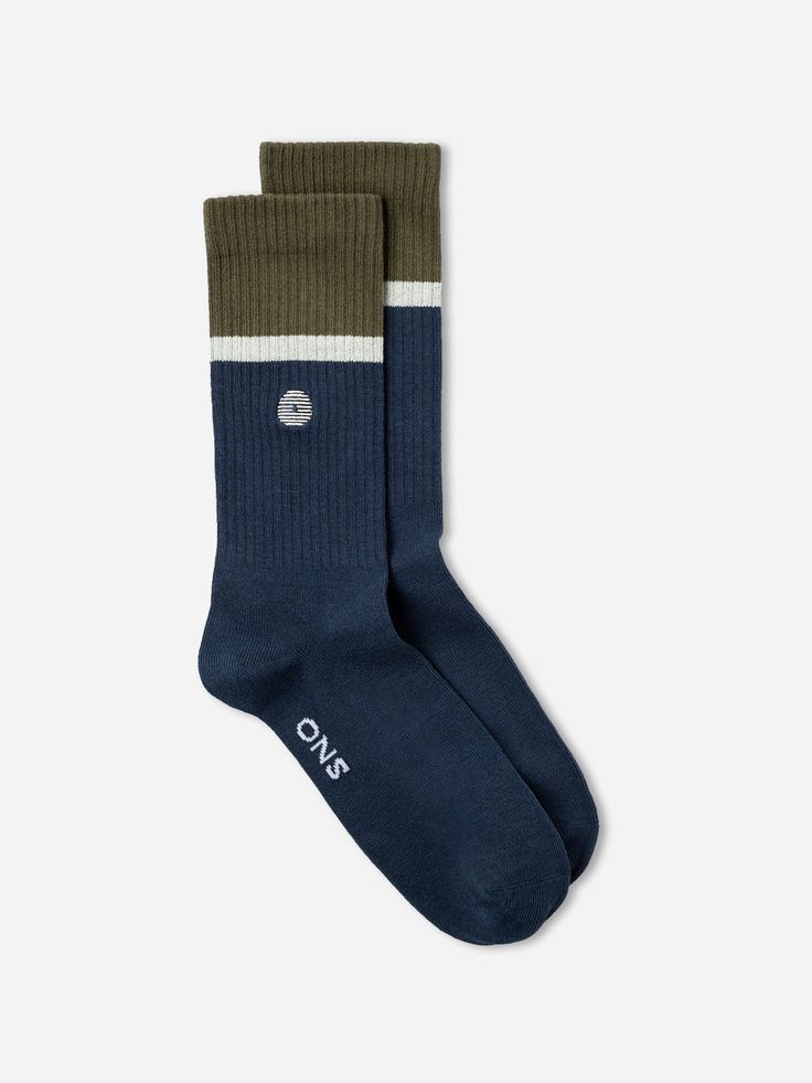 Stay cozy this season with ONS Stripe Socks. Featuring a ribbed knit and stylish colored striped pattern, these socks are sure to spice up any regular outfit. Ribbed Knit Stripe Pattern Stripe detailing Signature ONS Embroidery Stretch-cotton True to Size: Non-Washed Wash Cold, Tumble Low, With Like Colors Imported 71%Cotton 26%Nylon 3%Spandex One Size Mid- weight Casual Blue Socks For Fall, Casual Fall Blue Socks, Casual Socks With Ribbed Cuffs For Fall, Casual Fall Socks With Ribbed Cuffs, Casual Cotton Socks For Winter, Casual Ribbed Winter Socks, Striped Socks For Winter Stocking Stuffer, Striped Socks For Stocking Stuffers In Winter, Winter Cotton Socks With Ribbed Cuffs