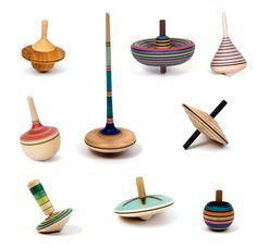 an assortment of wooden objects are shown in this image