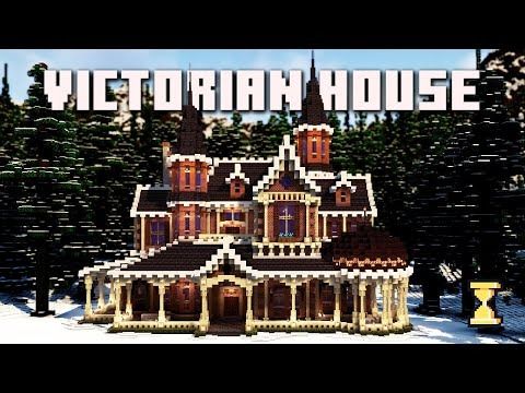 a large house made out of legos in the snow