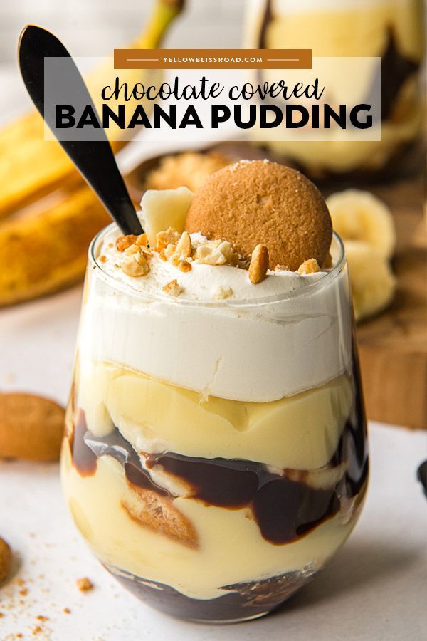 chocolate covered banana pudding in a glass on a table with bananas and other desserts