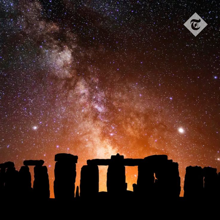 the night sky is filled with stars and silhouettes of stonehenge in front of them