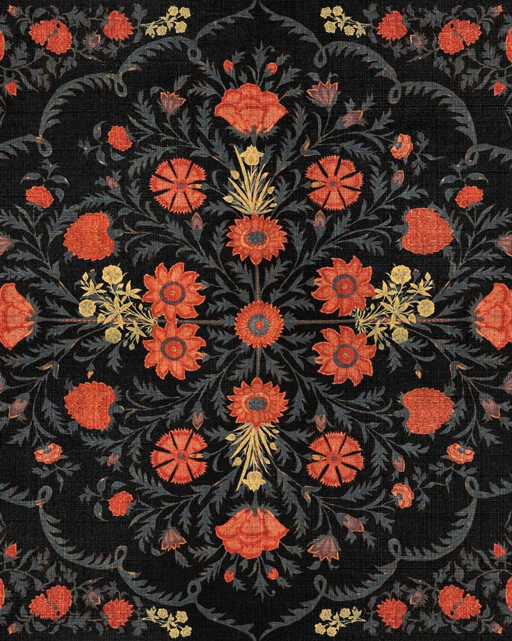 an intricately designed rug with red flowers and leaves on black ground, in the middle of