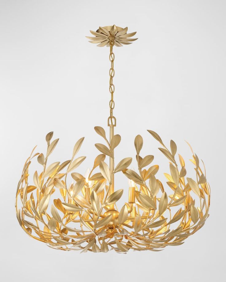 a gold chandelier with leaves hanging from it's center and two lights on each side