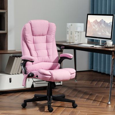 a pink office chair sitting in front of a computer desk with a monitor on it