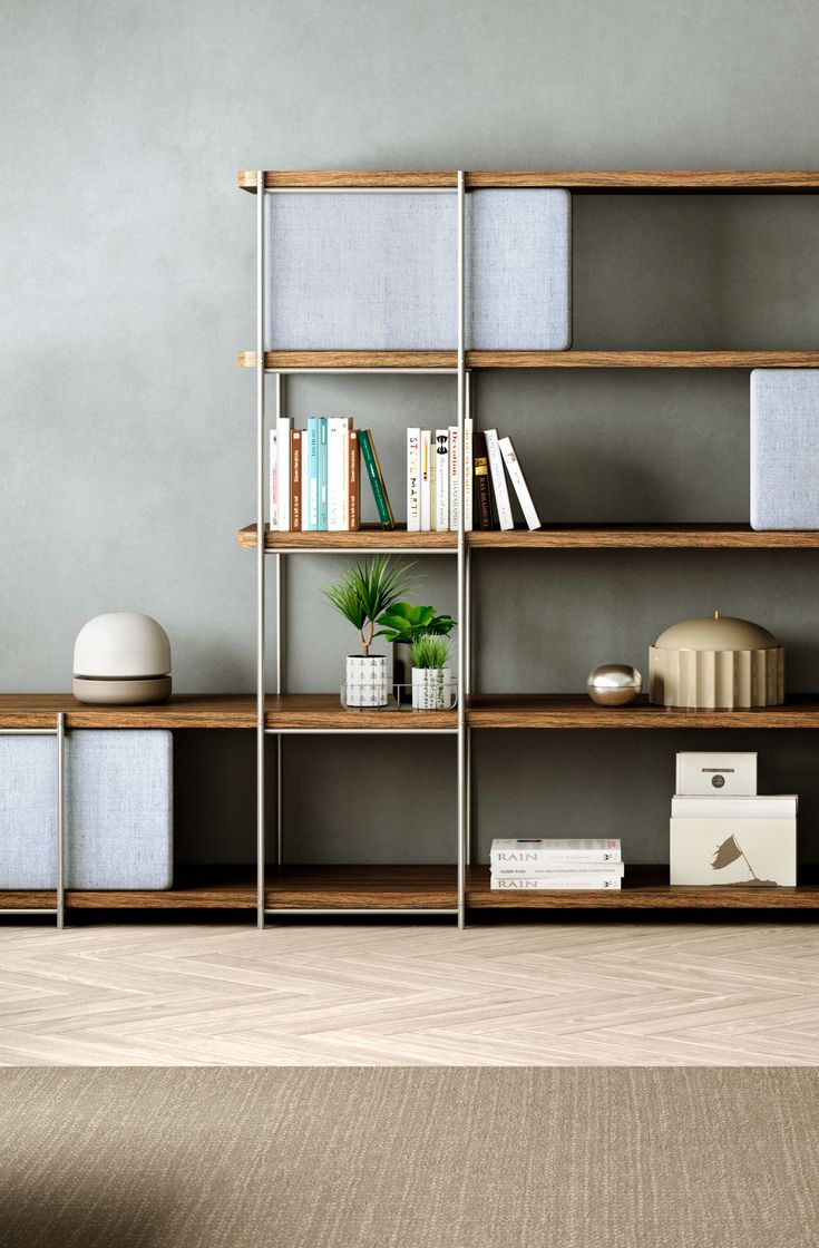 an empty room with bookshelves and various items on the shelves in front of it