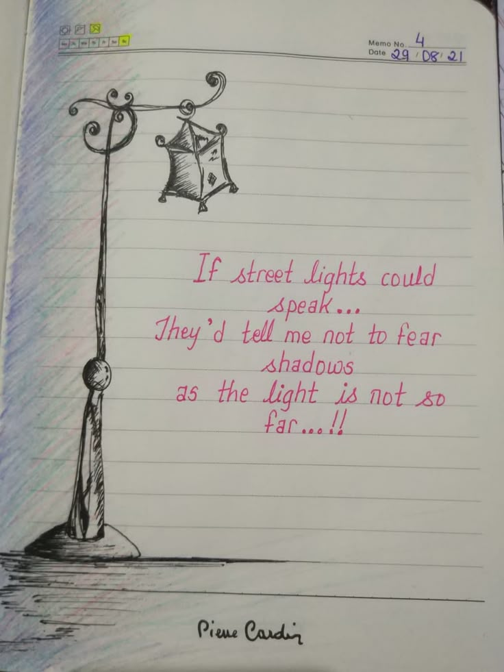 a notebook with a drawing of a street light and a poem written in pink ink