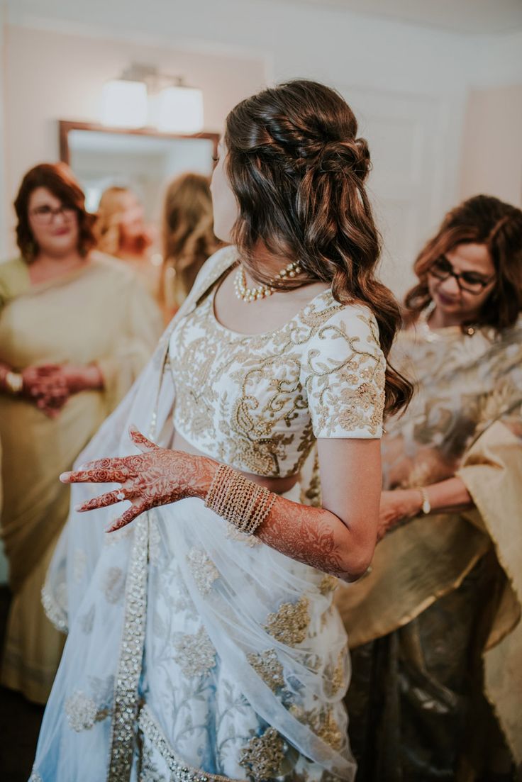 the bride is getting ready to walk down the aisle