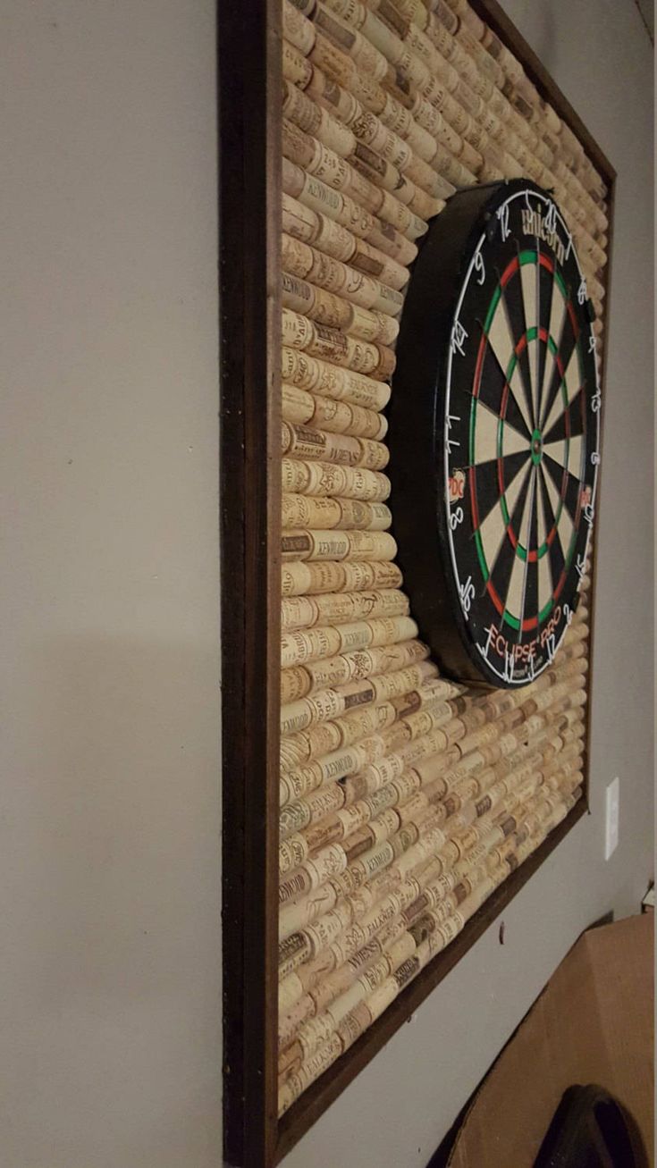 a dart board mounted to the side of a wall