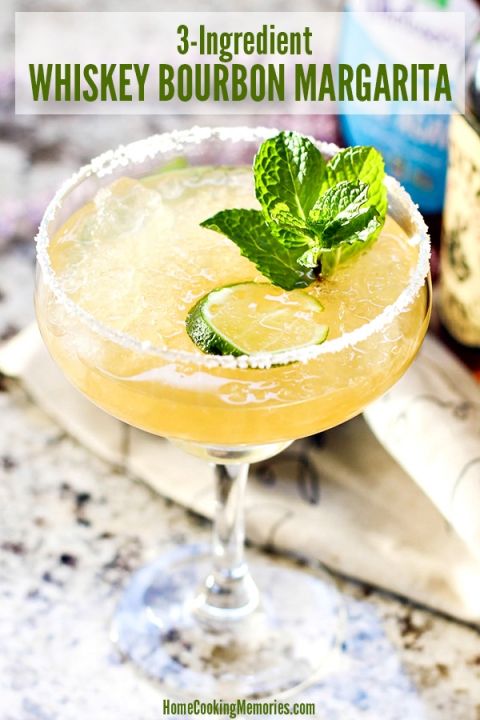 the three ingredient whiskey bourbon margarita is garnished with mint