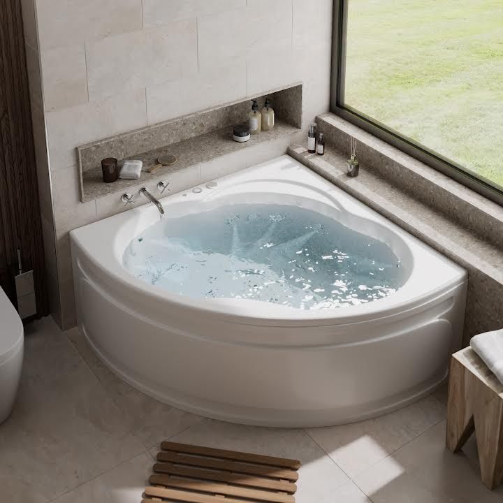 a large white bath tub sitting next to a window