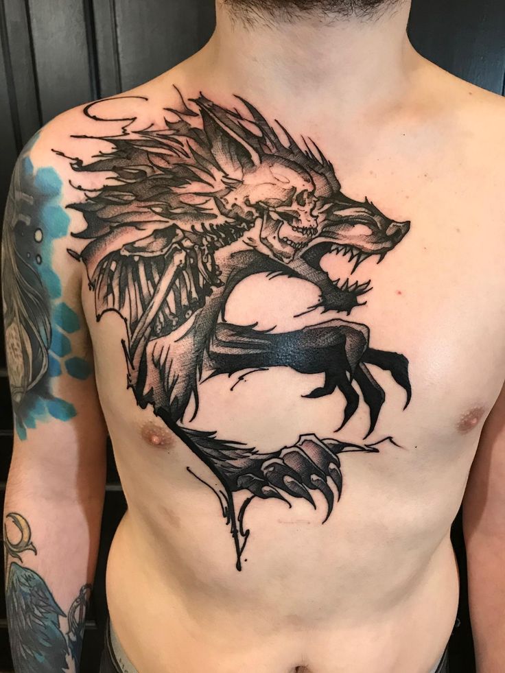 a man with a dragon tattoo on his chest