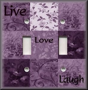 a light switch cover with the words live love laugh