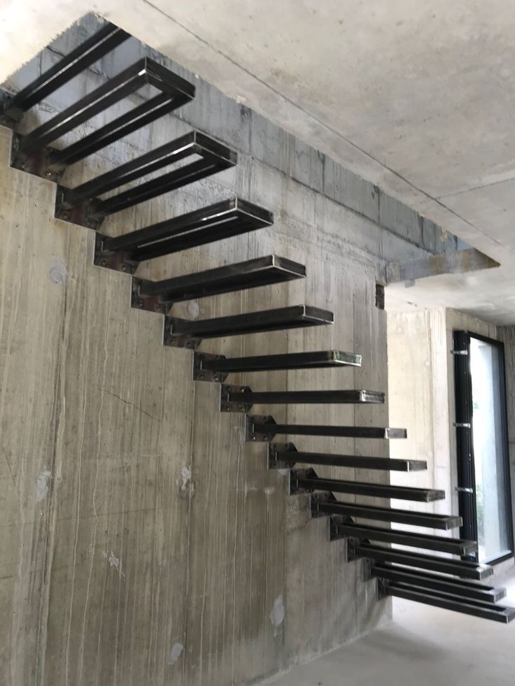 an image of a staircase going up the side of a building