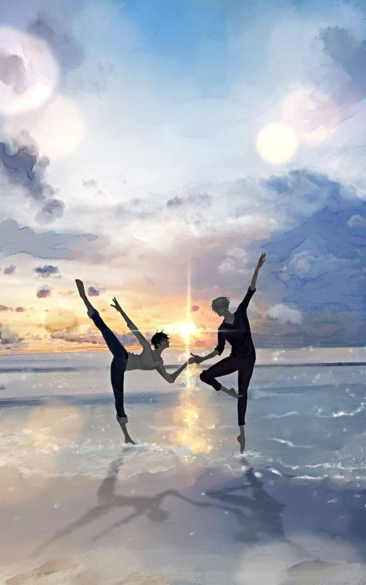 two people are dancing on the beach in front of an ocean and sky at sunset