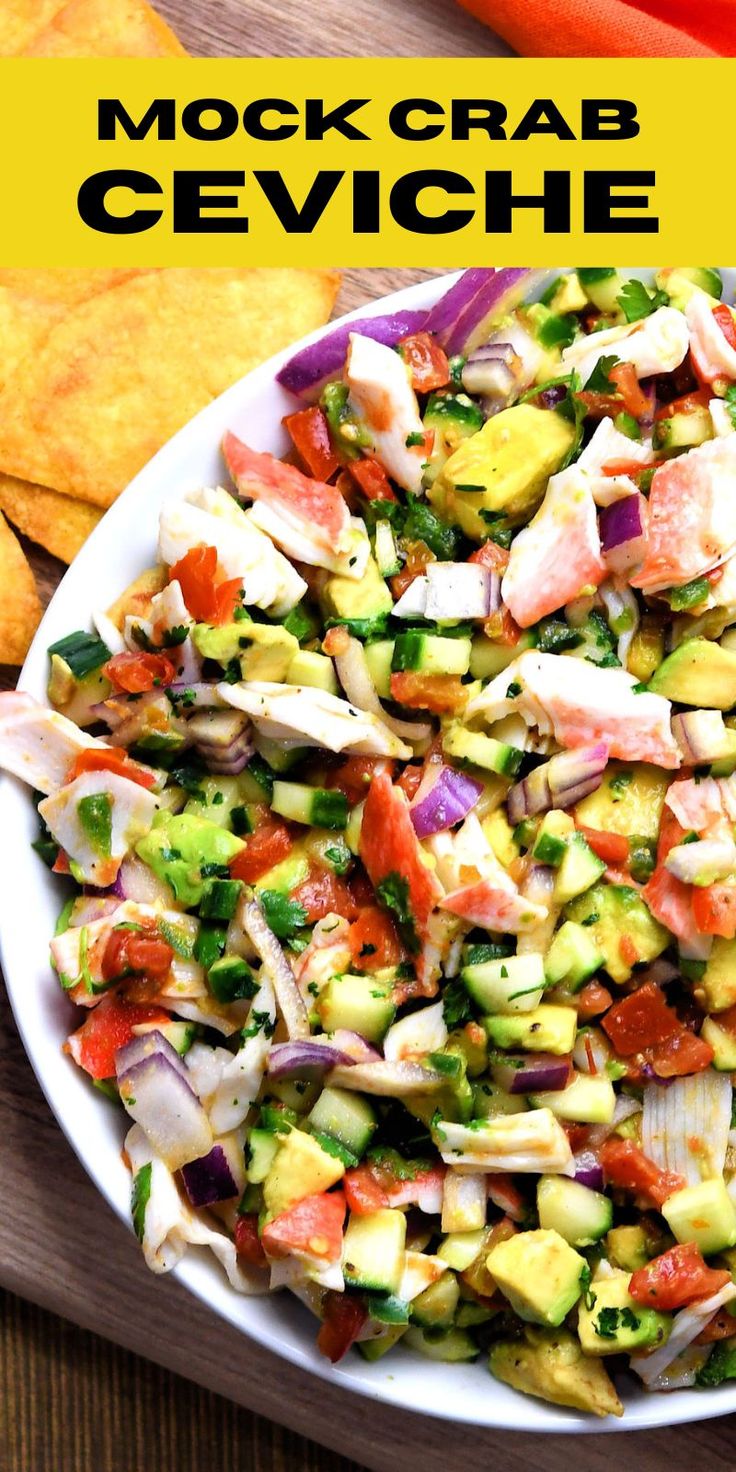 a white plate topped with salad next to tortilla chips