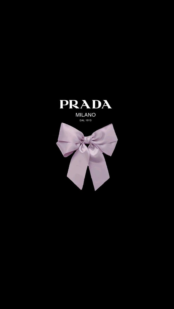 a black background with a pink bow on the front and back of it's cover