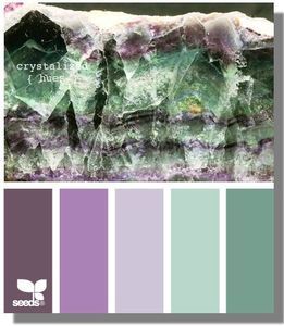 the color scheme is green, purple and white with an image of rocks in it