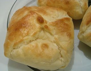 three pieces of bread sitting on top of a glass plate