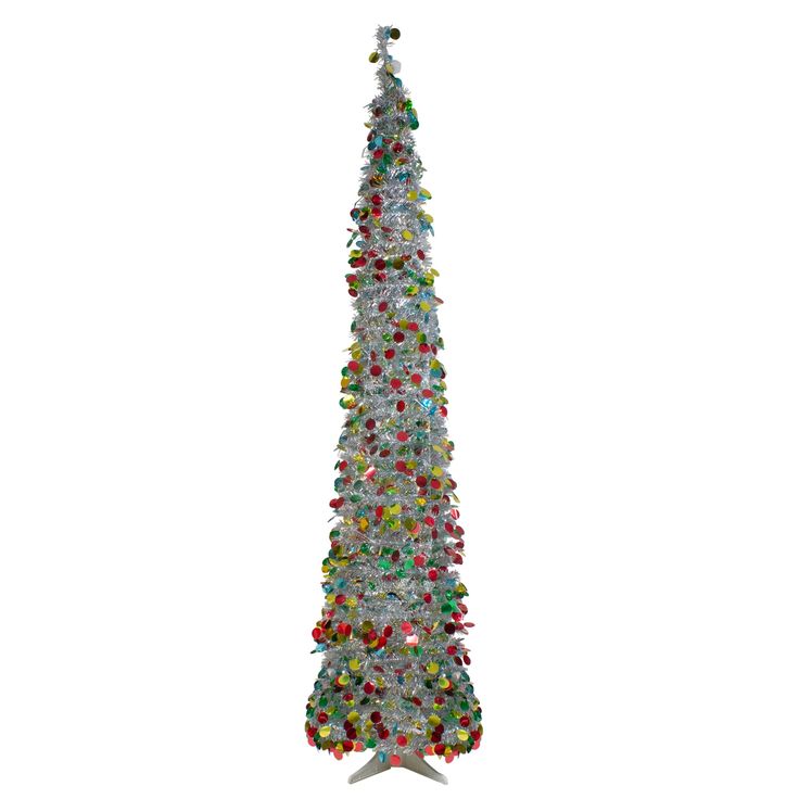 a white christmas tree with multicolored ornaments on it's top and bottom