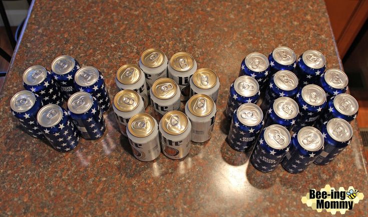 there are many cans of beer on the table