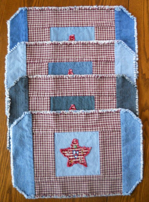 a patchwork quilted placemat with red, white and blue stars on it