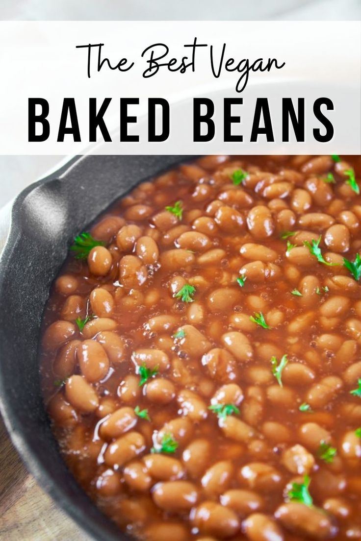 baked beans in a skillet with parsley on top and the words, the best vegan baked beans