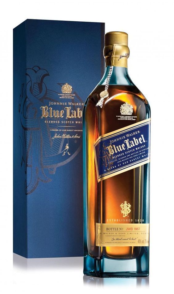 a bottle of blue label whisky next to a box