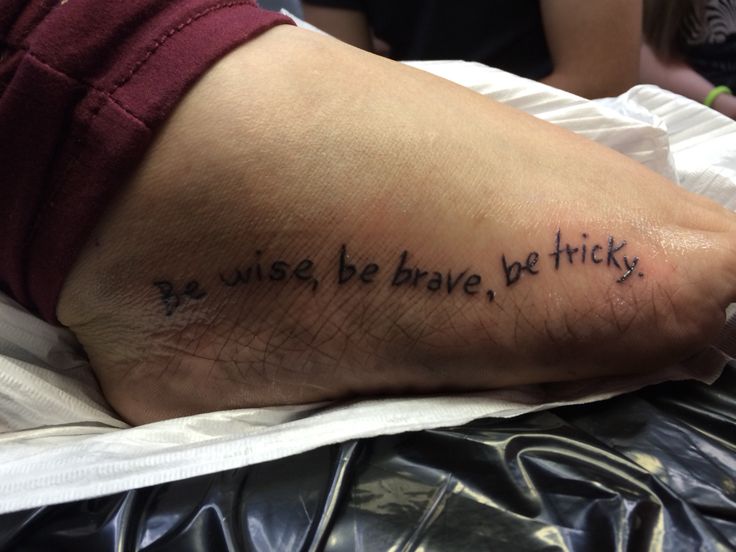 a person's foot with the words we use be brave, be tricky written on it