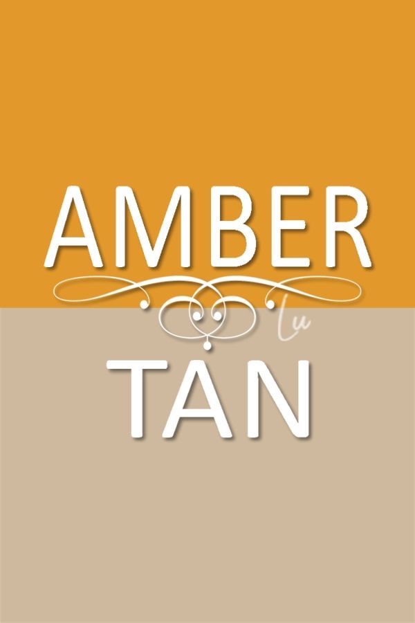 an orange and white banner with the words amber tan on it's bottom corner