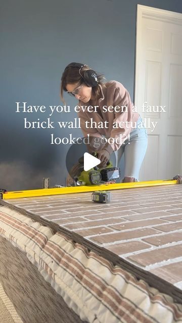 a woman is working on a mattress frame