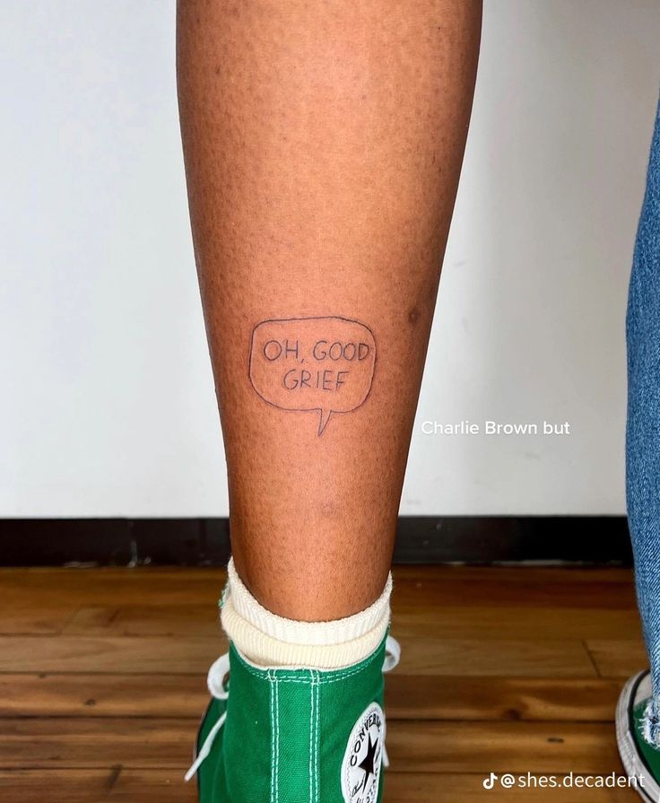 a person's legs with words written on them