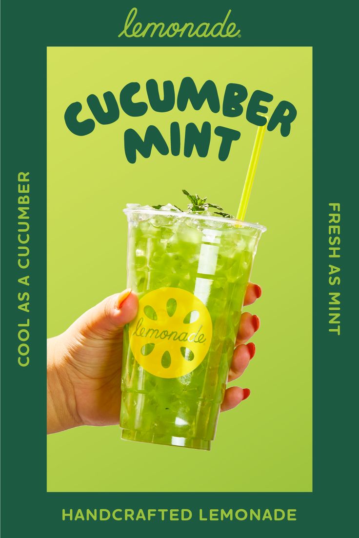 the lemonade cucumber mint drink is being held by a woman's hand