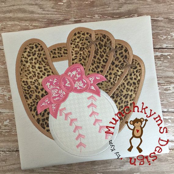 an animal print baseball mitt with a pink bow on it and the words happy new year