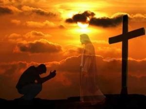 a person kneeling in front of a cross with the sun setting behind them and an image of jesus